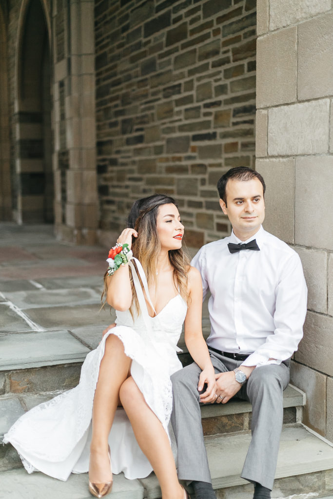 Couple sitting together on stone stairs