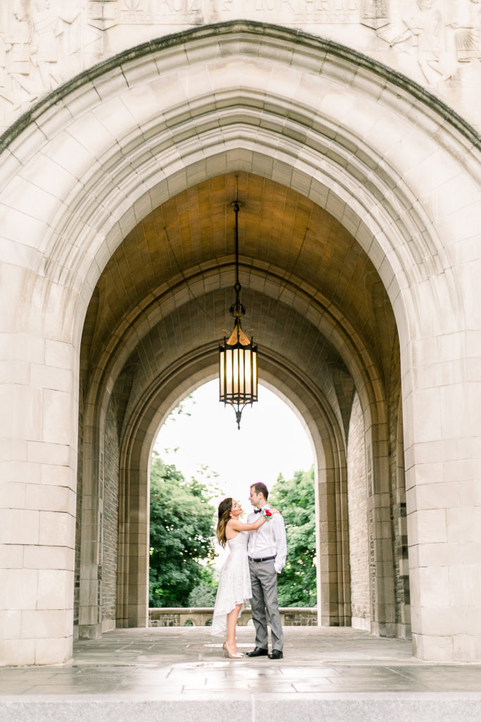Couple within a stone archway