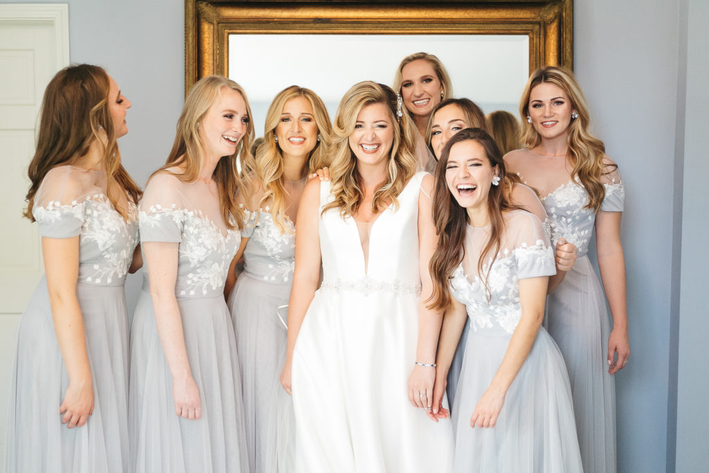 Genesee Valley Club wedding rooms with bridesmaids laughing