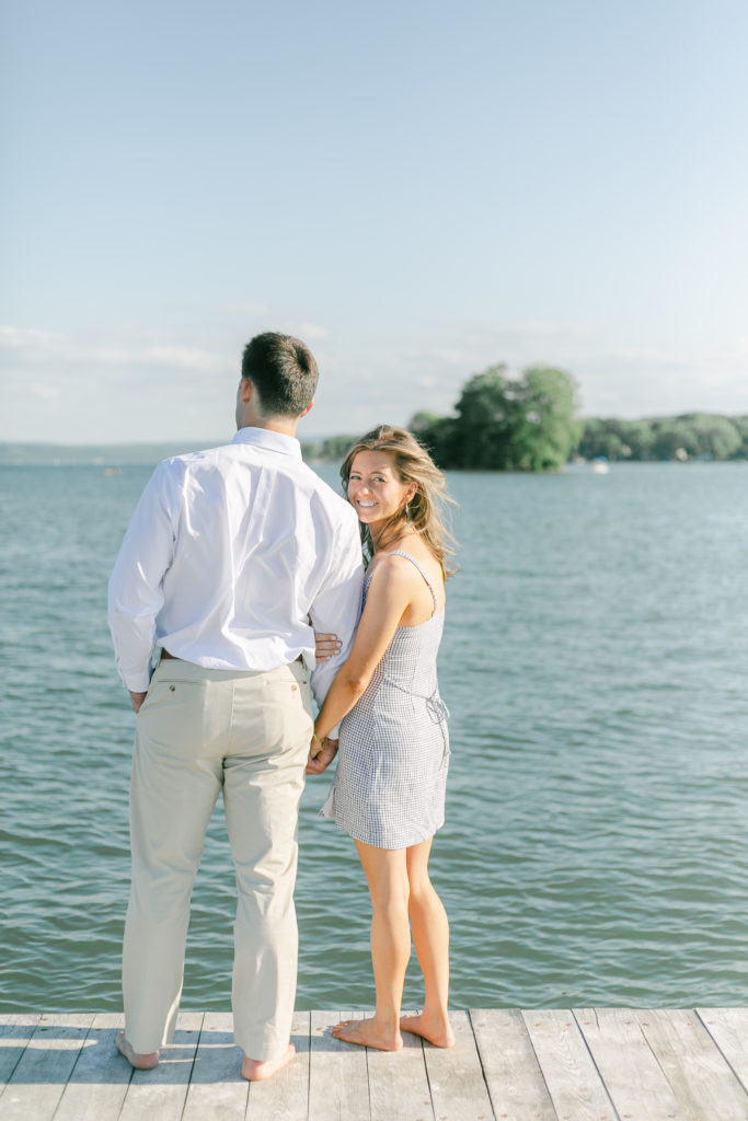 An engaged couple on the Canandaigua Lake docks.