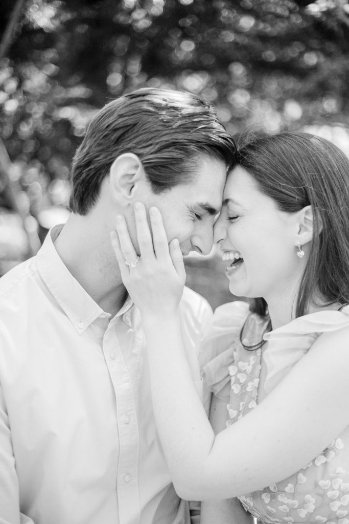 A black and white portrait of an engaged couple embracing during a Highland Park engagement session.